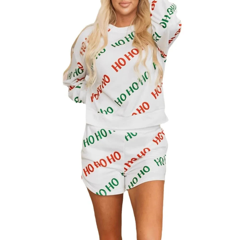 White women's two-piece suit with black letters print on the long-sleeved top and trousers.