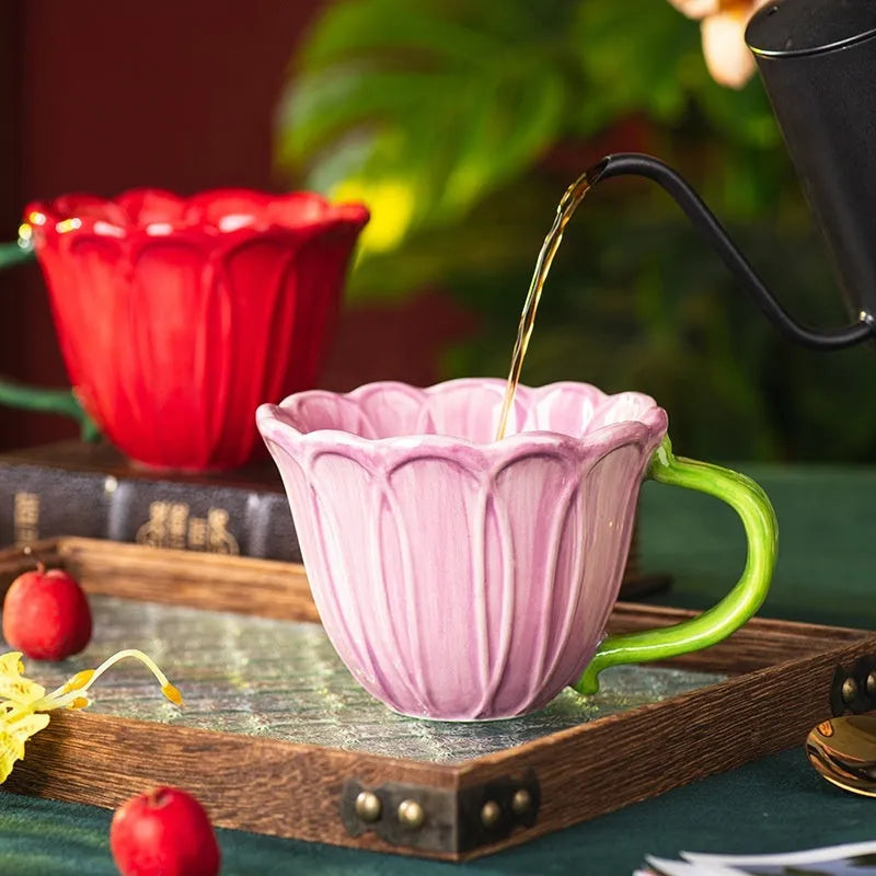 Ceramic breakfast cup with floral pastoral pattern showing 500ml capacity and red or purple colour options