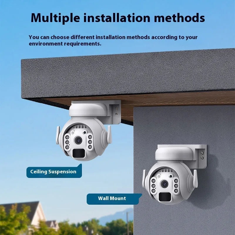 White solar-powered outdoor security camera with solar panel on top, mounted on a wall.