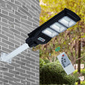 Integrated solar street light with solar panel and LED light in single unit for outdoor areas