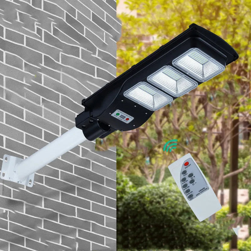 Integrated solar street light with solar panel and LED light in single unit for outdoor areas