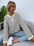 Black striped women's long sleeve top with drop shoulder design and button front
