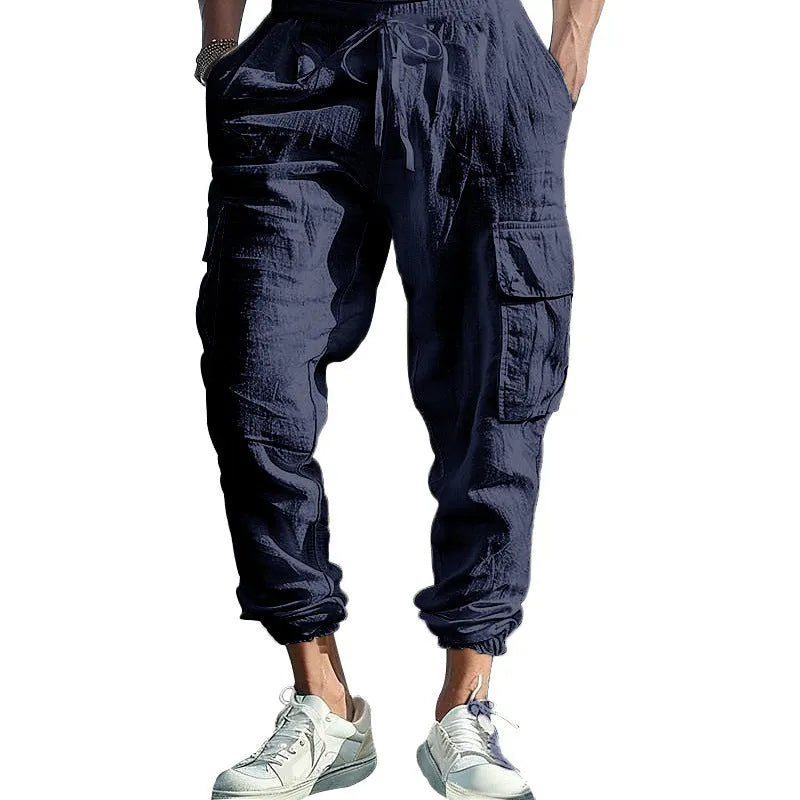 Men's ankle-tied casual trousers in linen fabric with multi-pocket design and drawstring waist