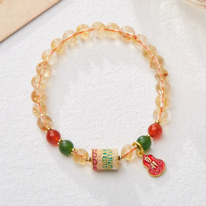 Hand-woven citrine crystal bracelet with five-sutra geometric design in fresh styling