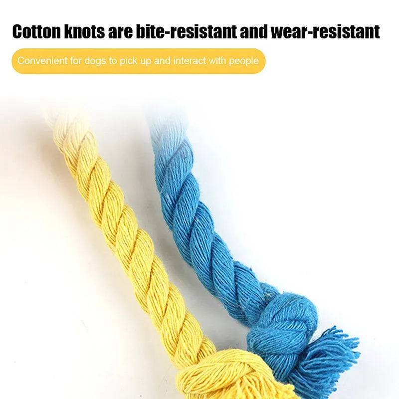 Elastic football design dog toy with cotton rope exterior and squeaker ball