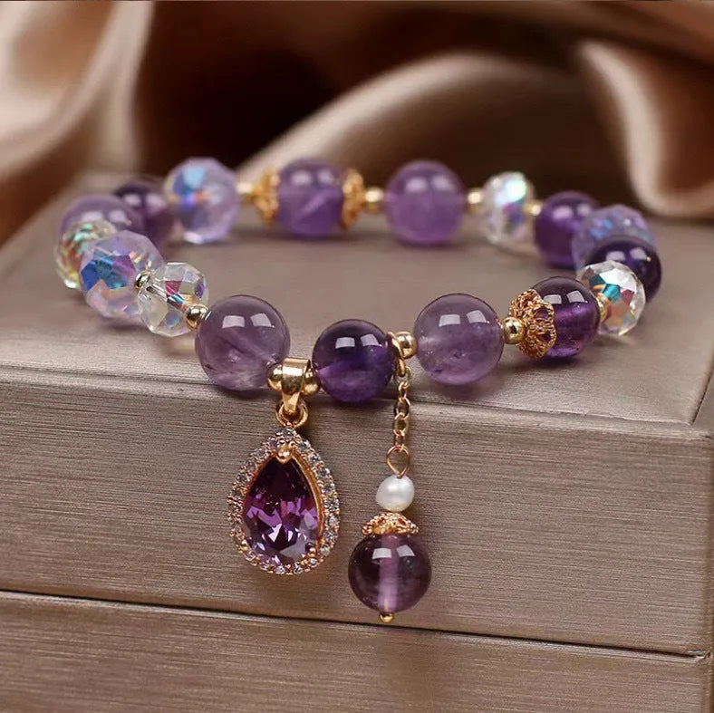 Purple amethyst crystal bracelet for women with micro inlay detail.