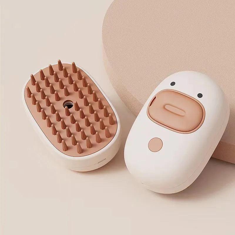White and yellow 3-in-1 rechargeable steam grooming brush for cats and dogs with rubber comb teeth