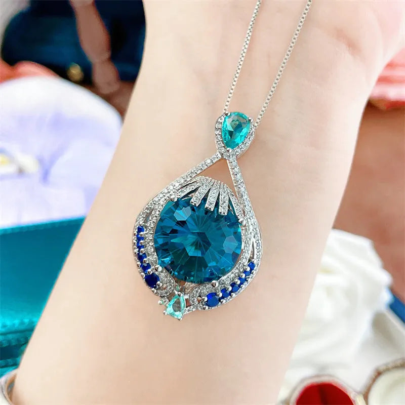 Blue crystal fireworks cut pendant necklace with water wave chain for women