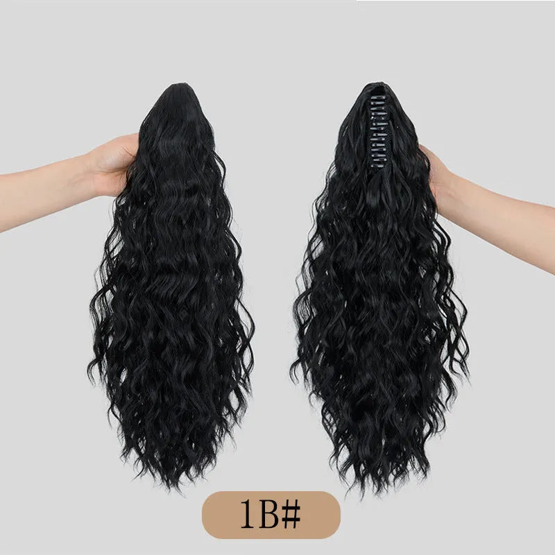 Corn curl synthetic wig with a water ripple grip ponytail in high temperature fibre, shown in colour 1B.