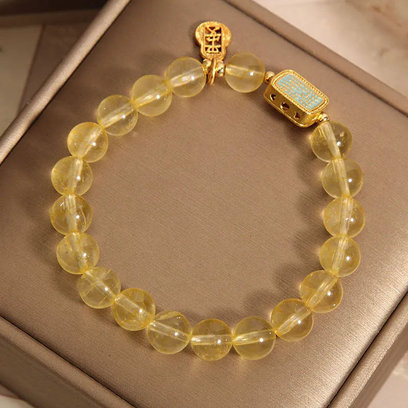 Women's natural yellow citrine crystal bracelet with rhinestone decorative details