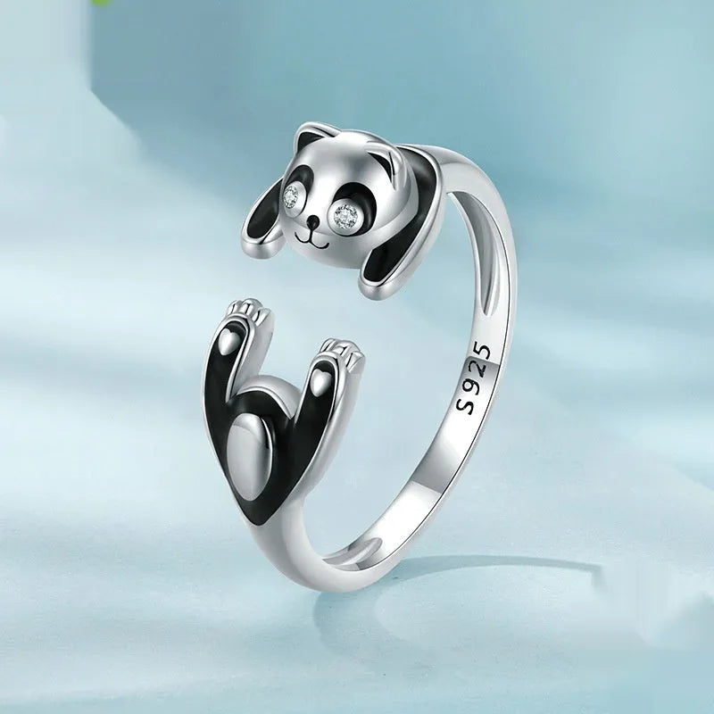 Adjustable sterling silver panda ring with white gold plating and open bracelet design.