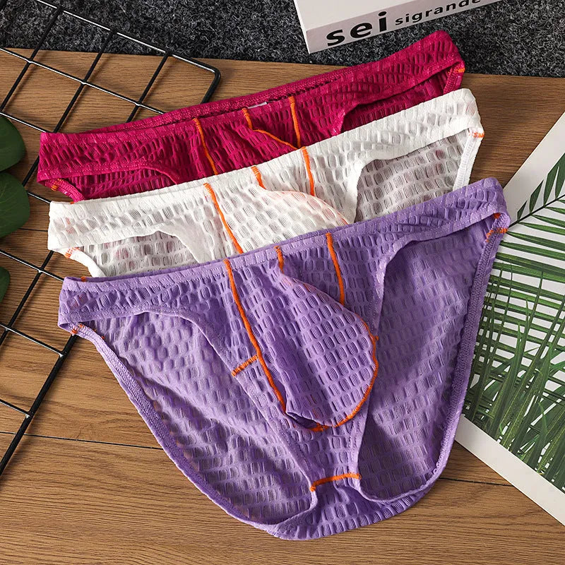 Men's low waist ice silk lace briefs in solid colours on a white background.