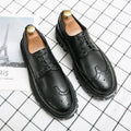 Men's black and brown brogue shoes with round toe design for business wear