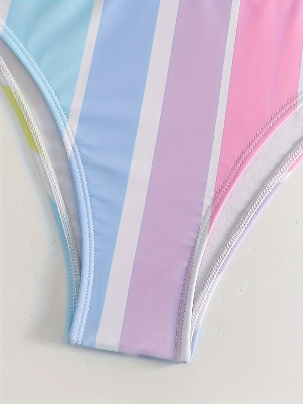 Women's striped bikini swimwear set with a sporty casual design