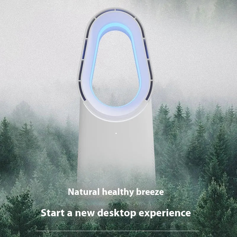 White bladeless tower fan with remote control on floor next to desk