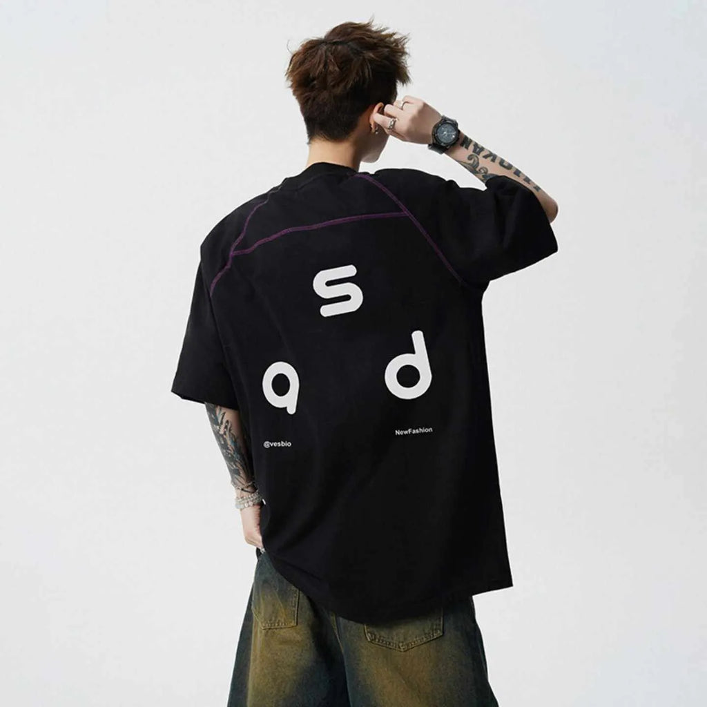 Men's loose fit cotton short-sleeve T-shirt with a printed letter design, shown in available colours.