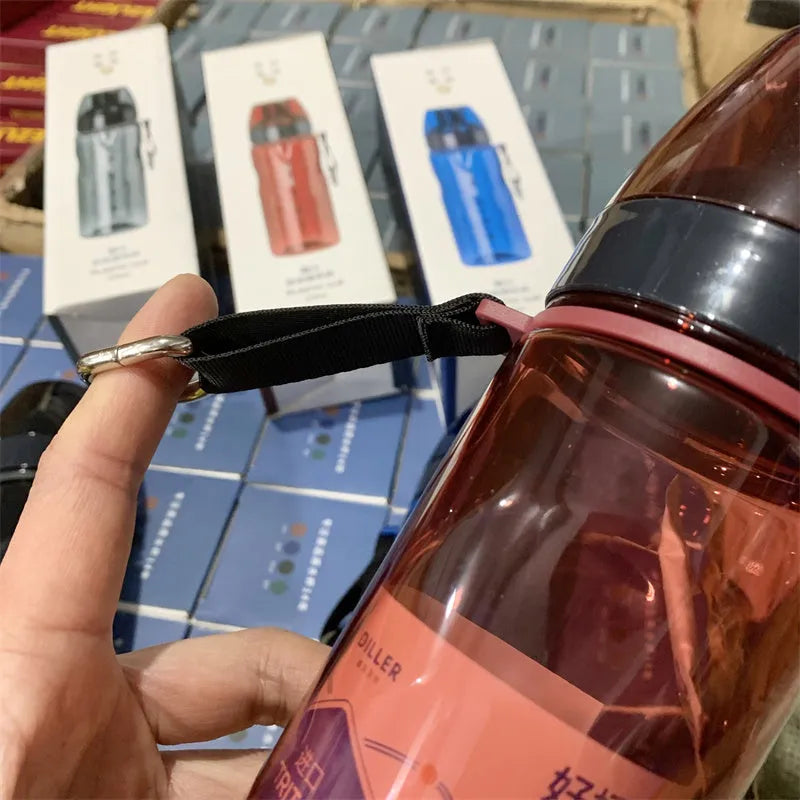 Chinese style outdoor portable water bottle with separate tea compartment in blue, red, black, or grey.