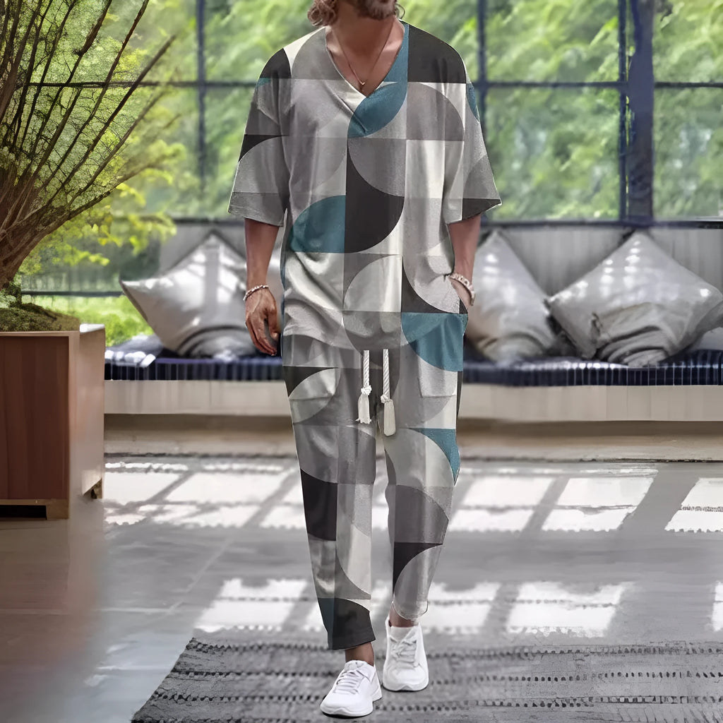 Mens grey cropped sleeve V-neck jacket and matching trousers suit on a hanger.