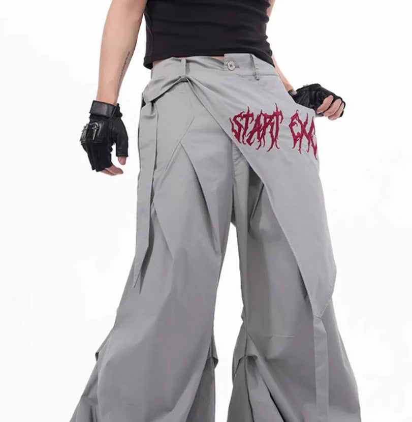 Boy modelling black wide-leg Korean-style casual trousers.