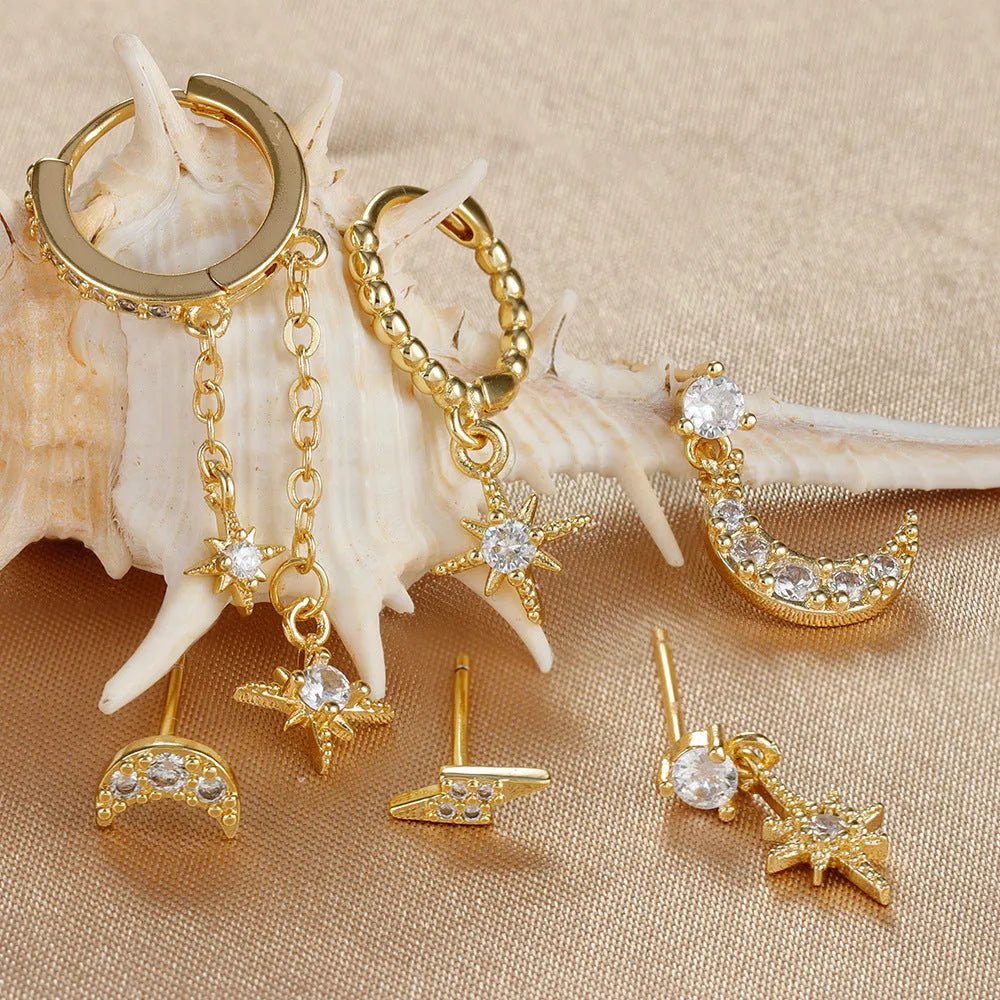 Set of six gold-coloured chain tassel earrings with zircon studs for women.