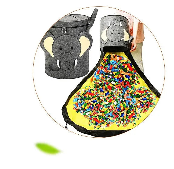 Green felt cube storage bag with pull rope laid flat as play mat for toy organisation
