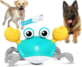 Blue crawling crab dog toy with obstacle avoidance sensors and LED lights on hardwood floor