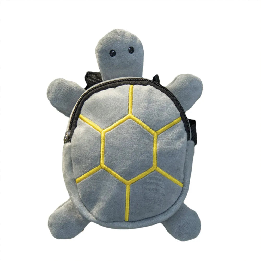 Brown velvet turtle-shaped dog harness with integrated backpack and front metal zipper.
