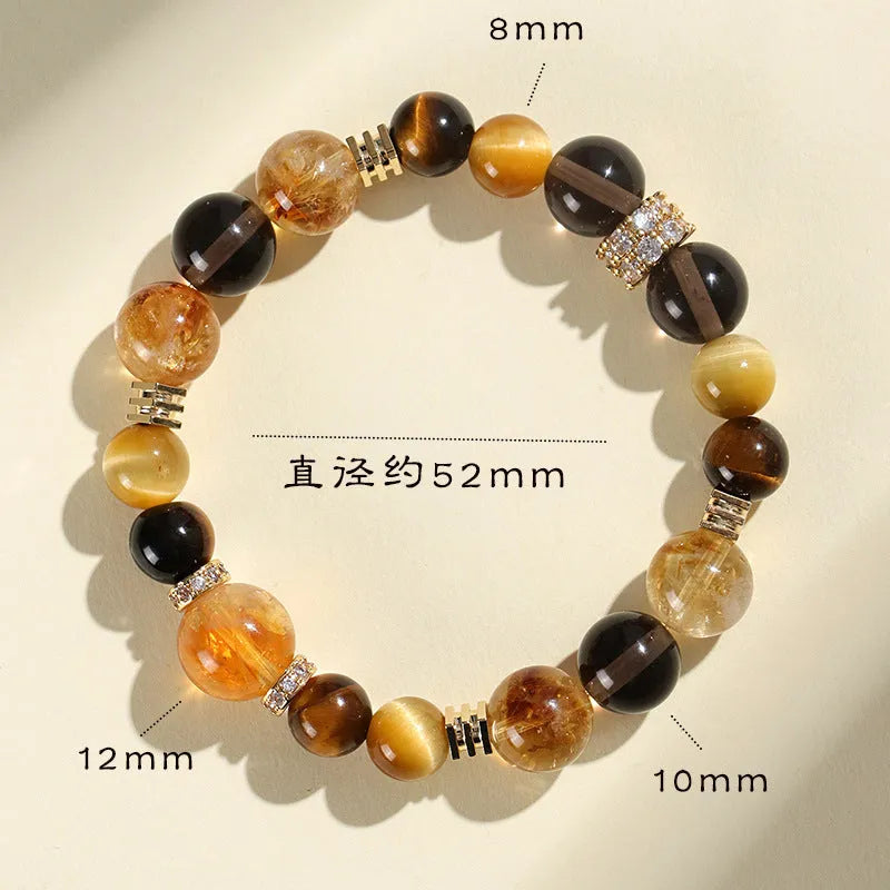 Natural yellow women's bracelet with 10mm artificial crystal string beads on a wrist.