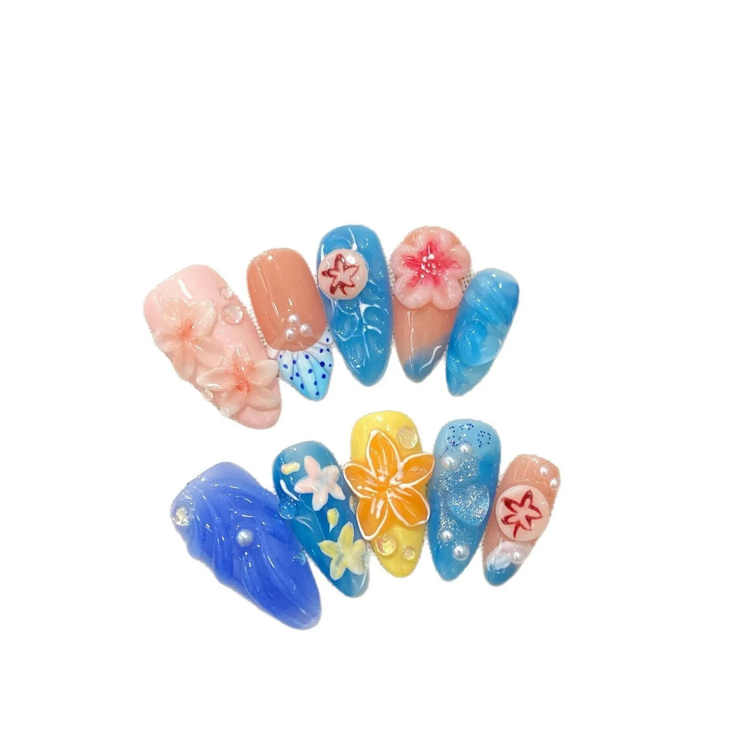 Three-dimensional carved jellyfish plastic armour set in almond nail colour, showing rose and tulip patterns.