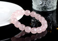 Pink crystal barrel bead bracelet with bamboo accents and geometric design