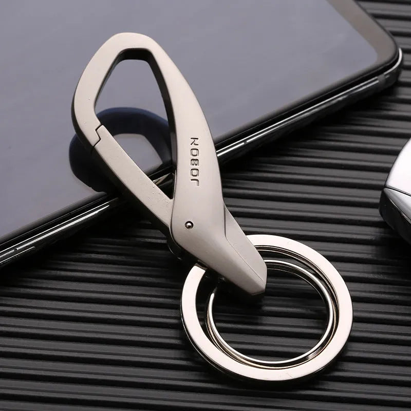 Zinc alloy double ring car key chain in black, chrome, and nickel colour options showing 8.3cm size