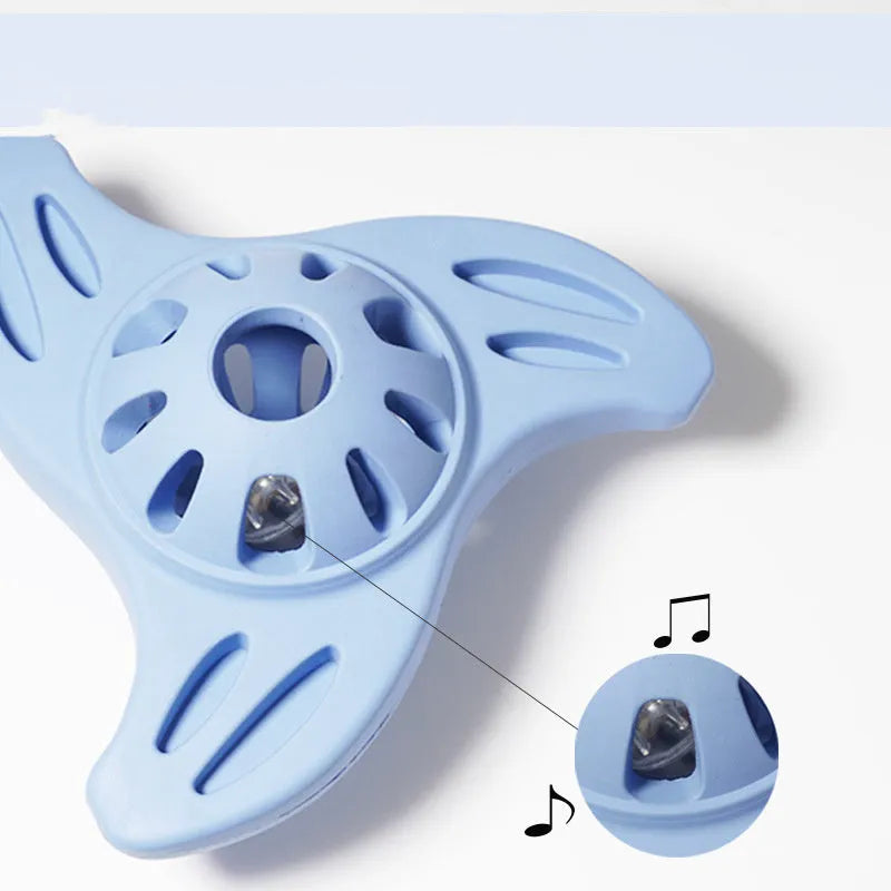 Blue plastic boomerang-shaped dog chew toy with textured molar edges for medium and large breed dogs