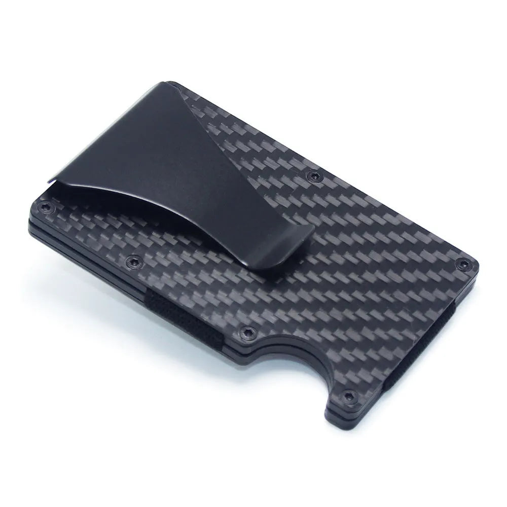 Carbon fibre and aluminium card wallet with geometric design holding multiple cards
