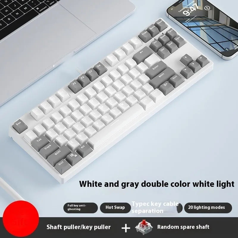 87-key wired mechanical gaming keyboard with multi-colour keycaps on a metal body.