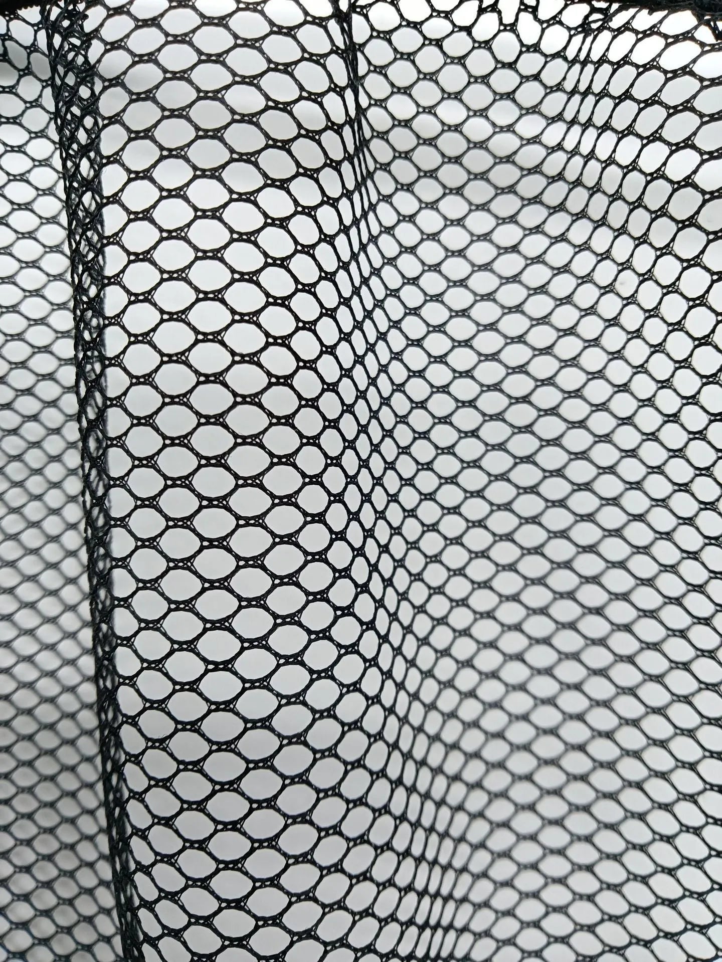 Black polyester elastic storage net for car boot organisation in two size options