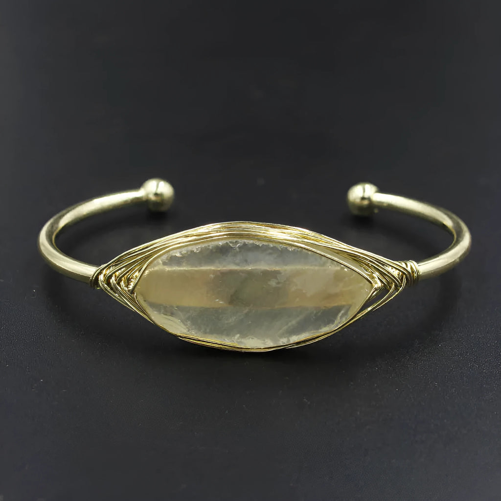 Natural raw gemstone bracelet with amorphous 8mm beads and a simple metal opening clasp.