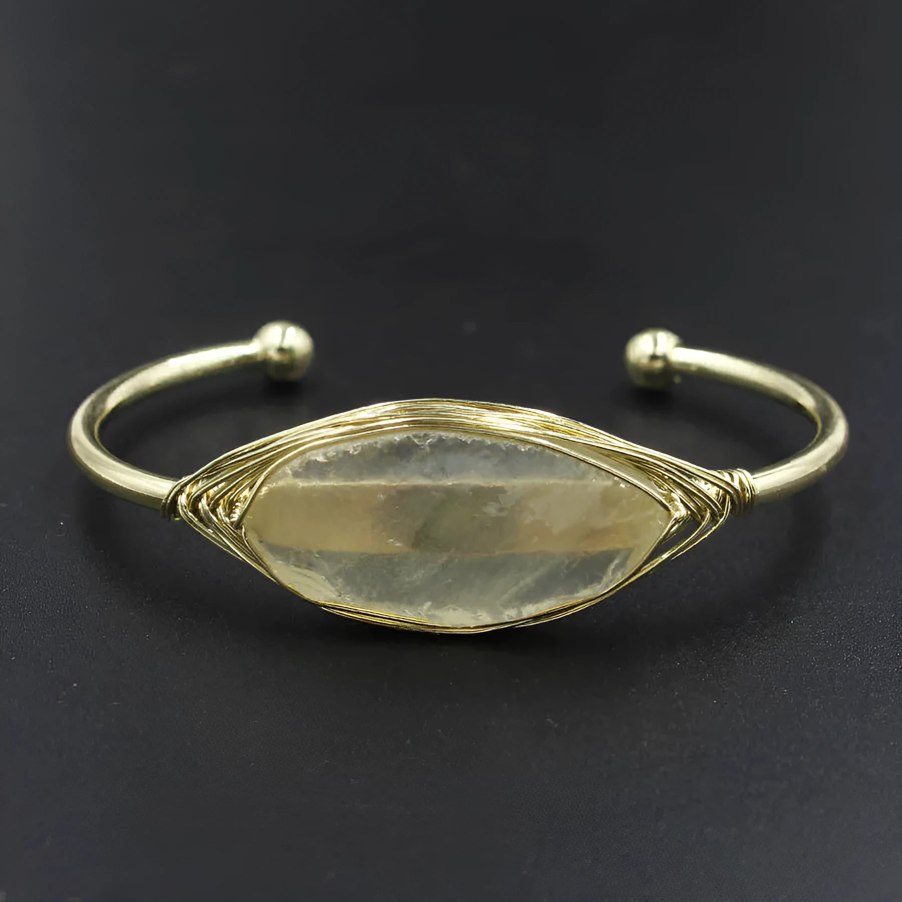 Natural raw gemstone bracelet with amorphous 8mm beads and a simple metal opening clasp.