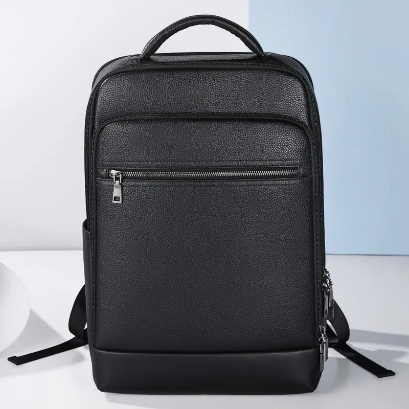 Black leather men's business computer backpack with sewing line detailing and curved shoulder straps