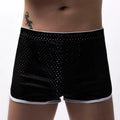Men's breathable three-point boxer shorts in cotton blend fabric on a mid-waist mannequin