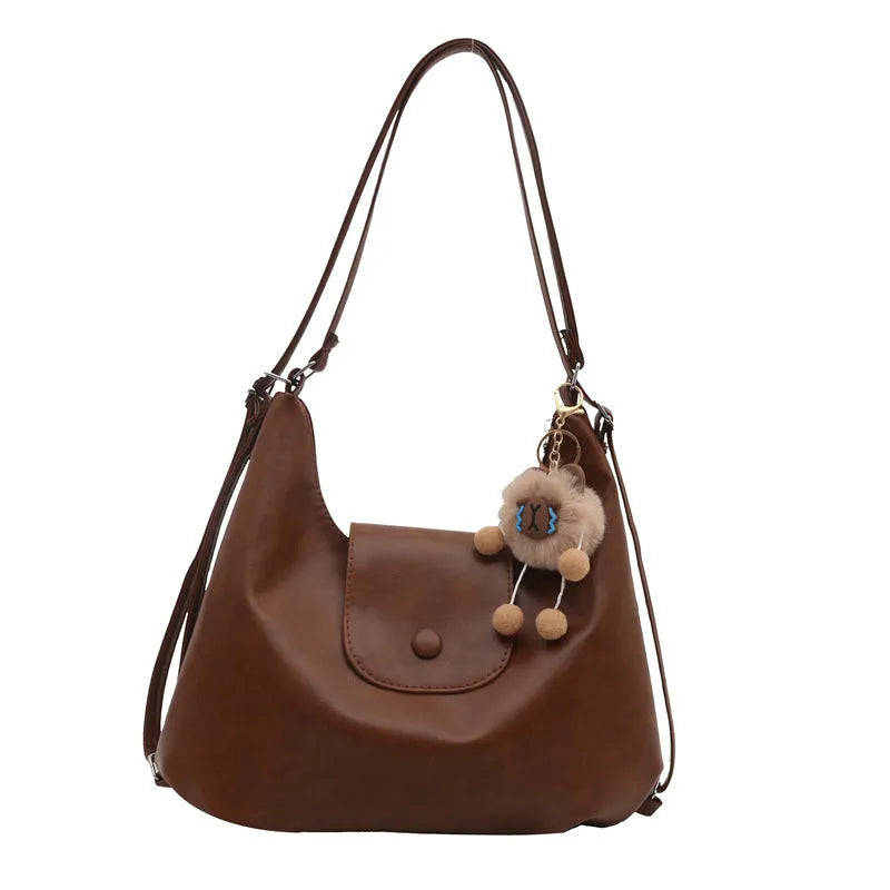 Large capacity PU leather commuter shoulder bag with mobile phone compartment in urban simplicity design