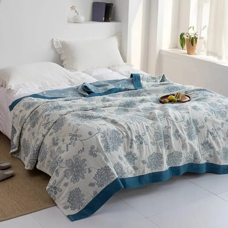 Pure cotton five-layer gauze bed sheet blanket in roulette wheel blue pattern showing textured surface