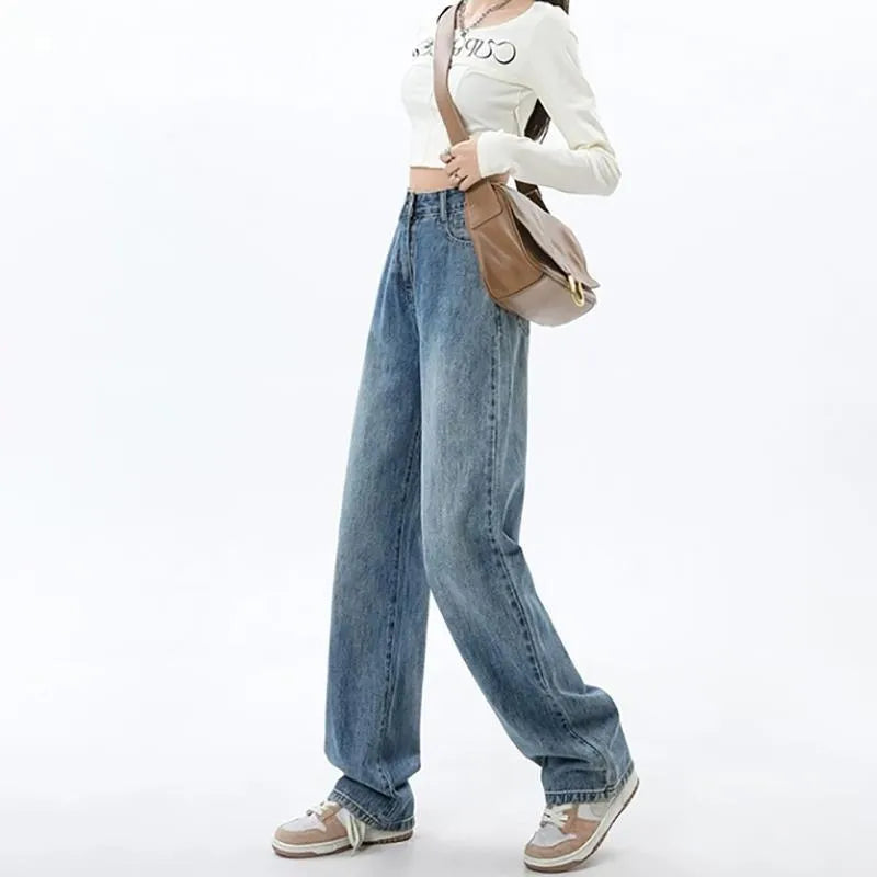 Women's high waist wide leg jeans in retro blue denim with straight leg silhouette