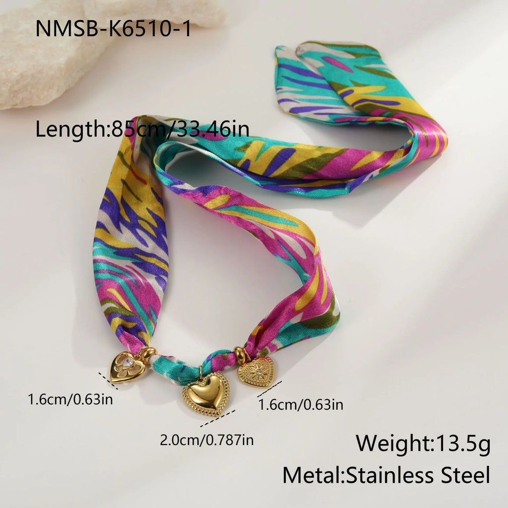 Stainless steel geometric pendant necklace with 18K gold electroplated finish and adjustable chain