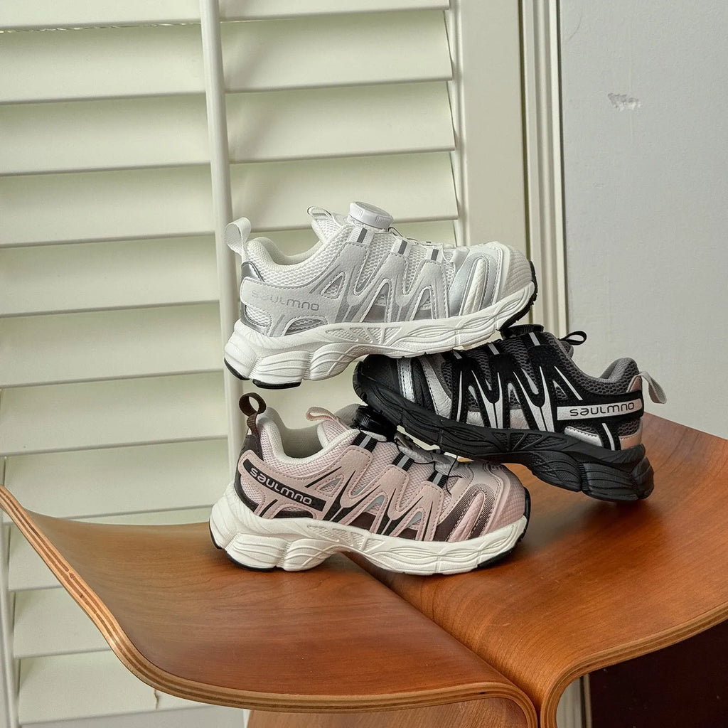 Girls' lightweight casual shoes in breathable PU leather mesh, shown in solid black, beige, or pink.