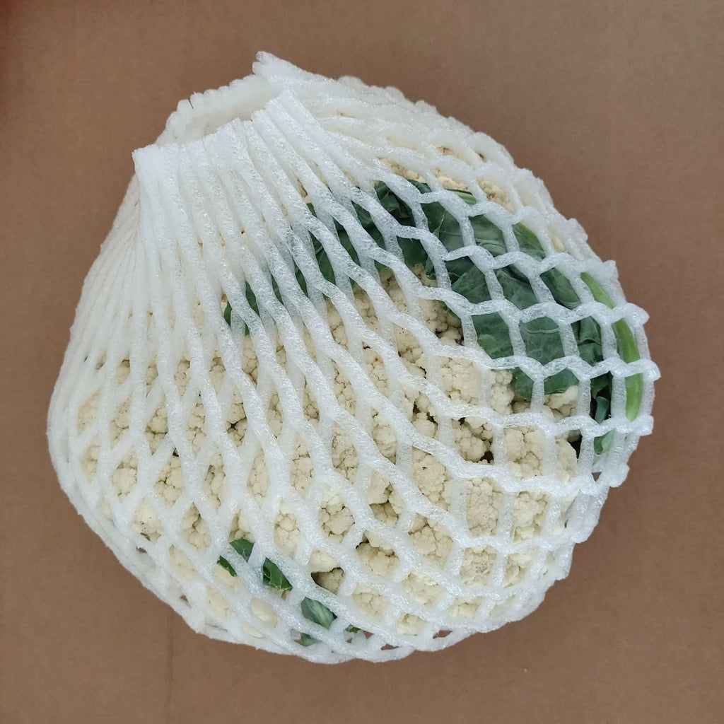 White foam fruit protection nets showing different sizes for apples, pears and peaches