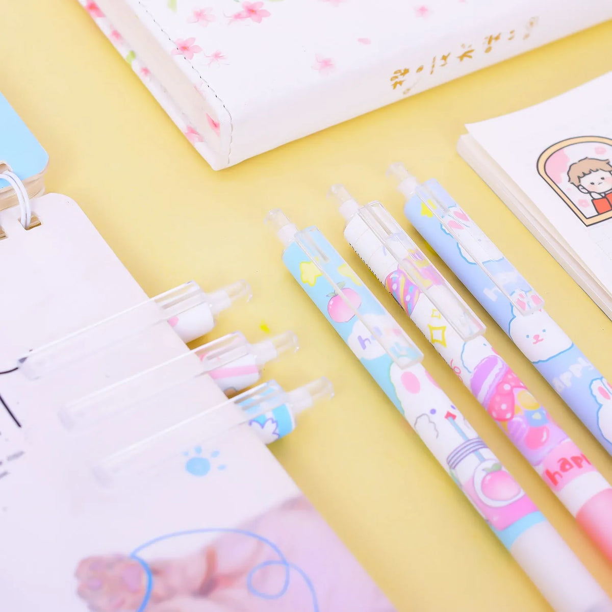 Six cartoon bunny design pens with 0.5mm black ink in plastic barrels