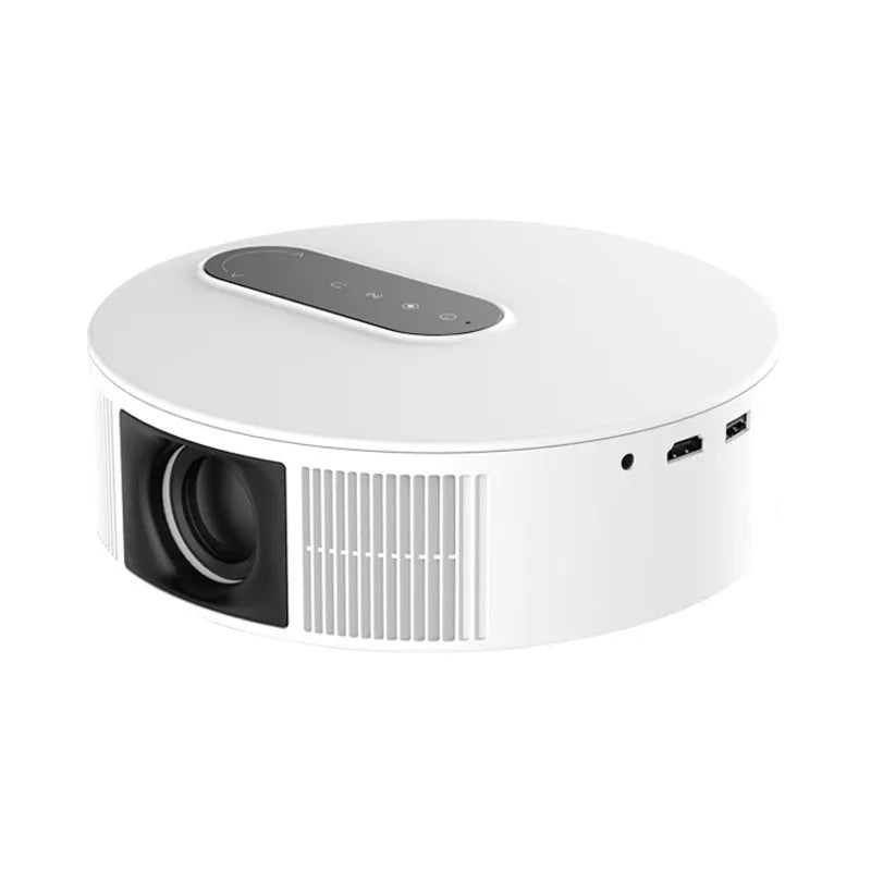 White HD home cinema projector with remote control on a wooden surface.