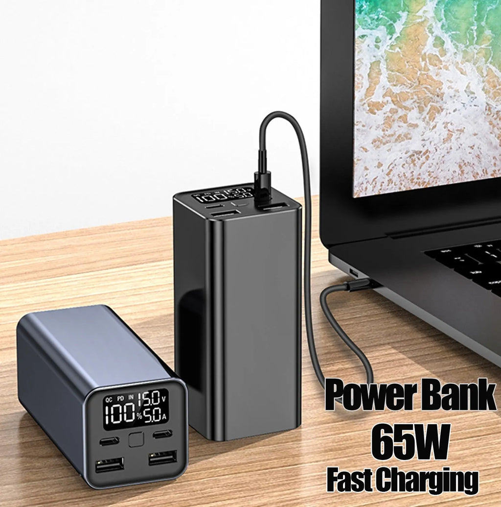 High power laptop charging bank with metal casing showing black, blue, and grey colour options