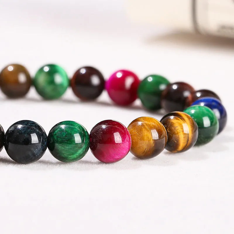 Colourful Tiger Eye stone bracelet with round beads on a mixed string, showing available sizes.