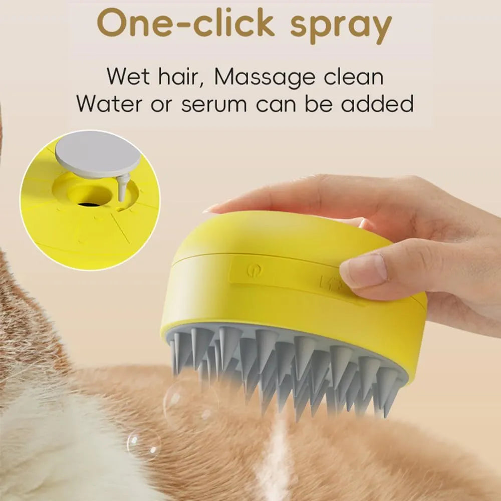 Green and yellow rechargeable silicone steam brush for grooming cats and dogs on a white background.